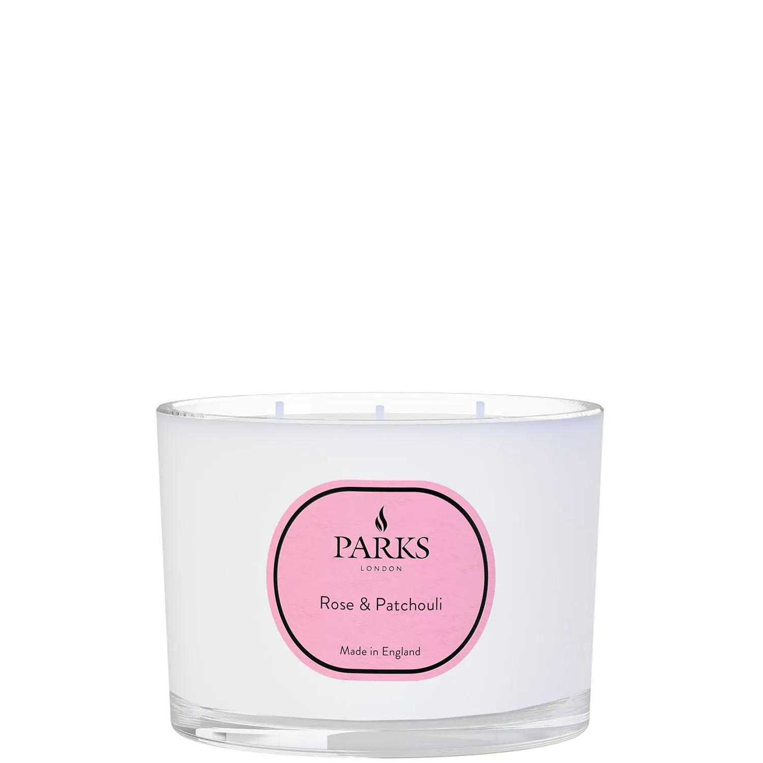 A white, three-wick candle with a label that reads 'PARKS Rose & Patchouli', indicating the fragrance and brand, with a pink accent on the label.