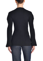 A back-facing image of a model wearing a black knit shirt