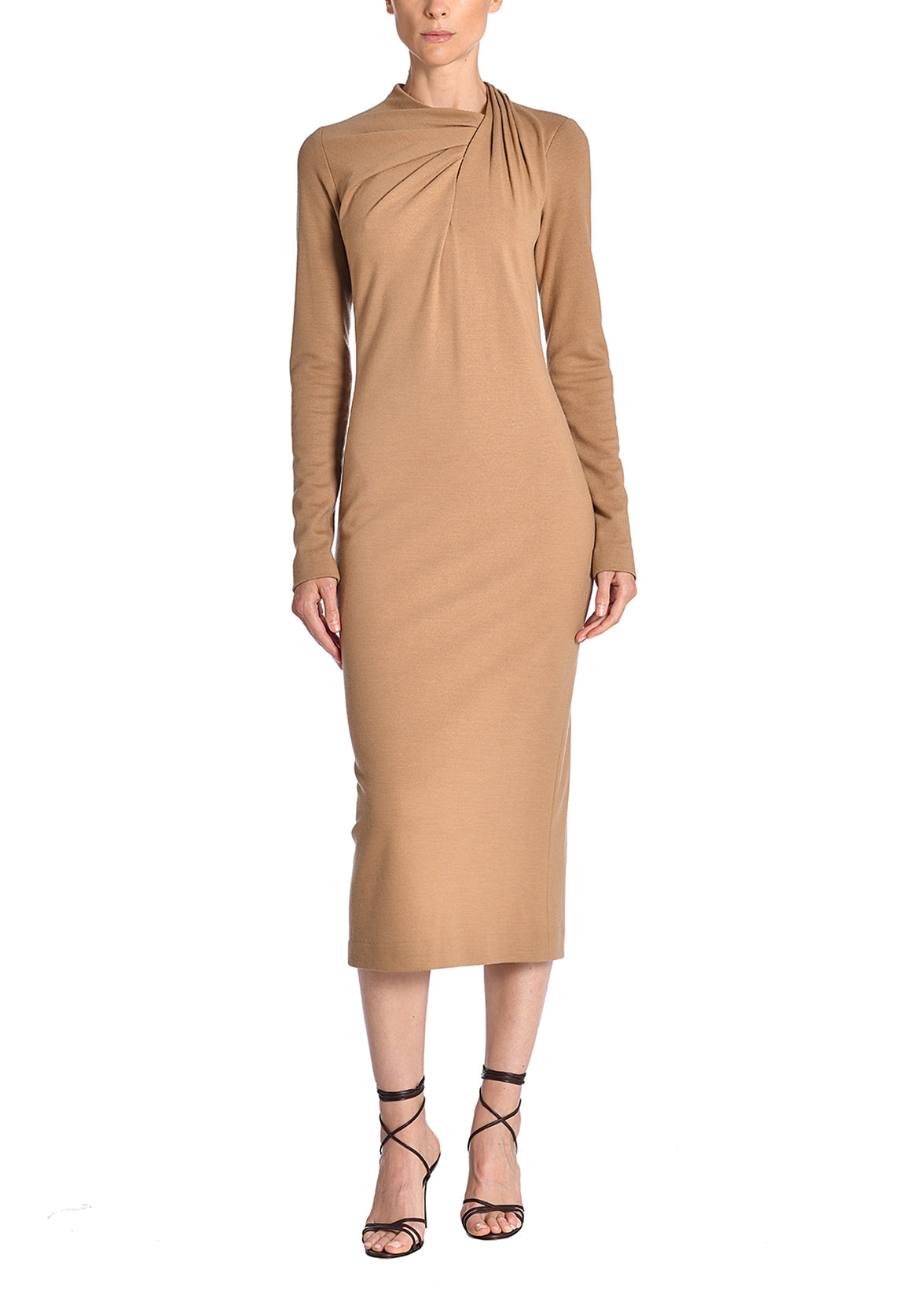 A full body image of a model wearing a camel midi dress. 