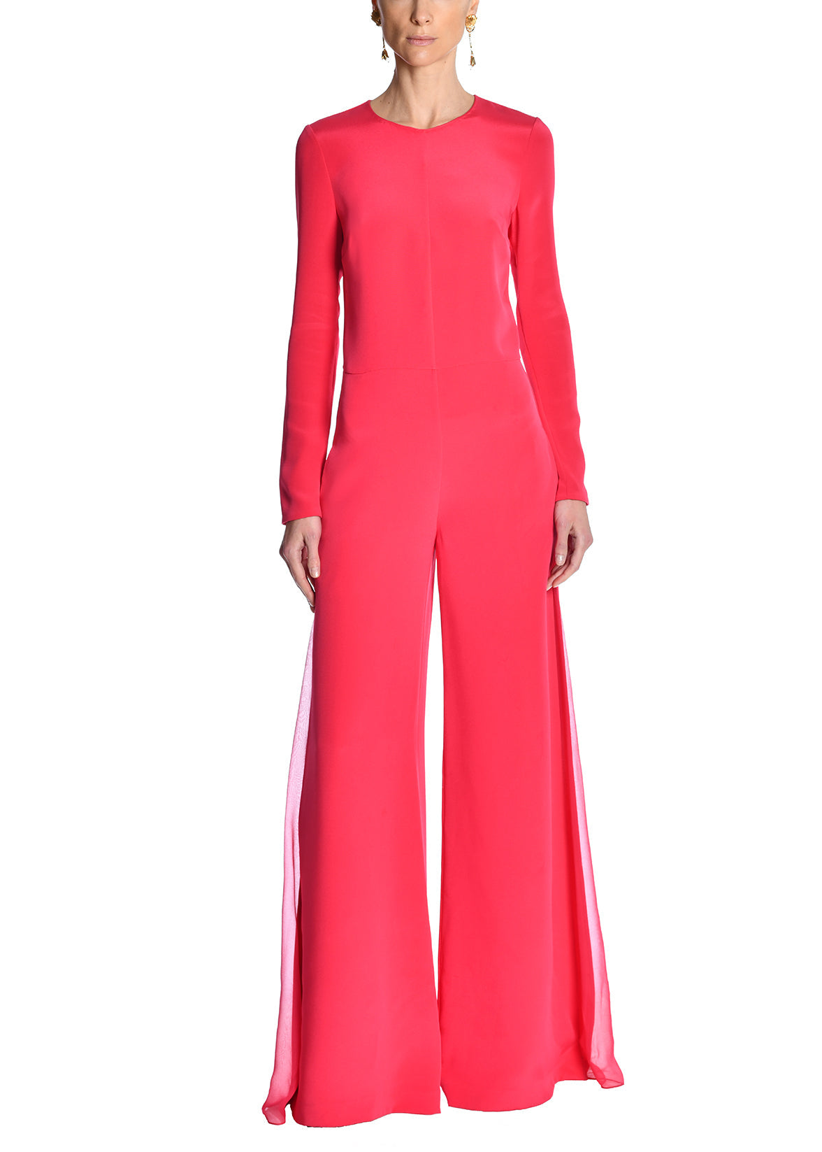 Model wearing pink jumpsuit. 