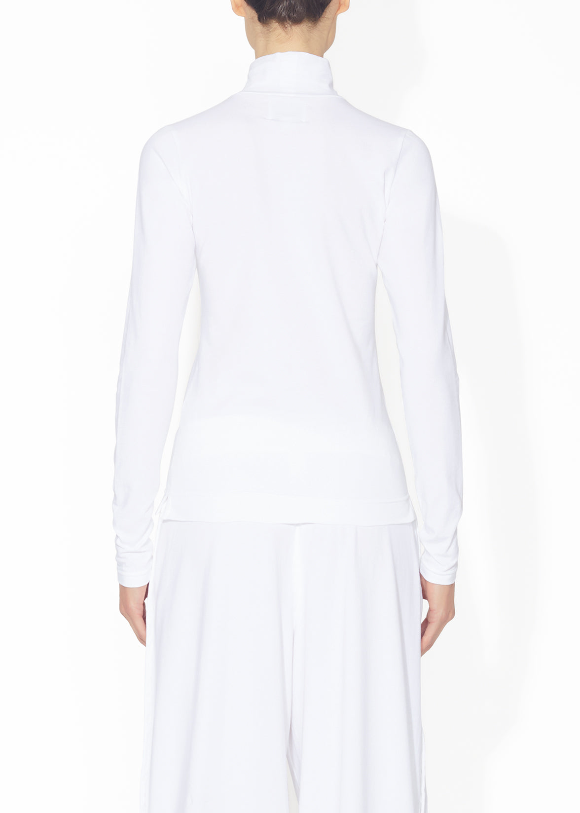 A back view of a white turtleneck.