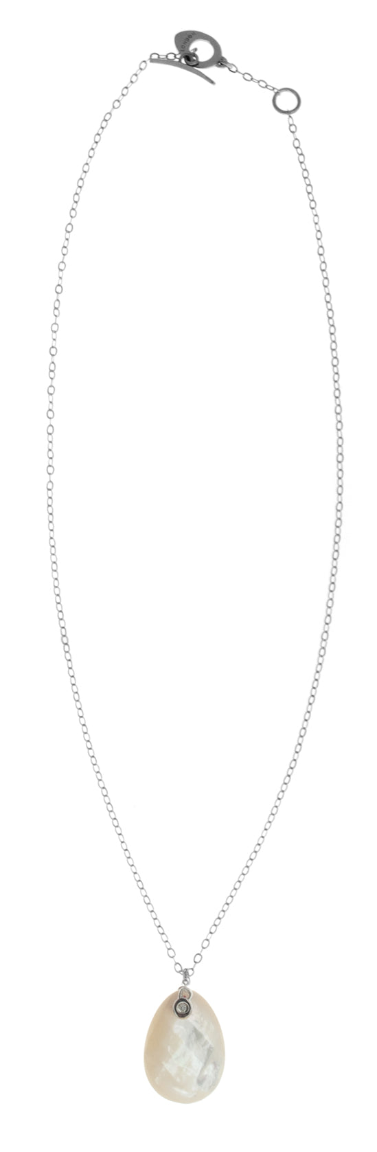 Mother of pearl pebble with diamond