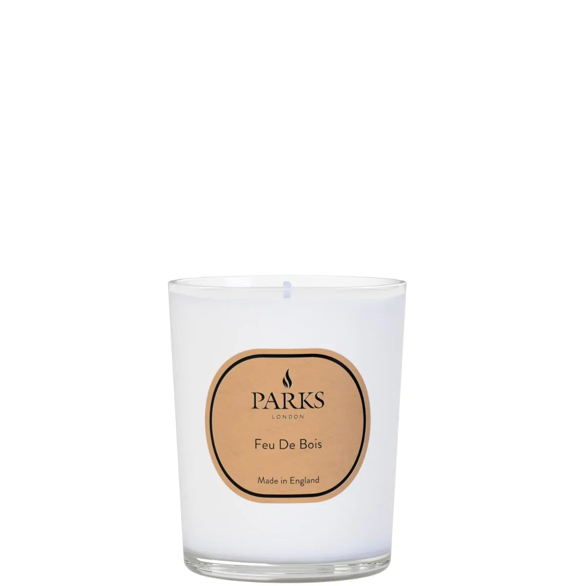 A white candle with a label reading 'PARKS Feu De Bois', indicating it is made in England.
