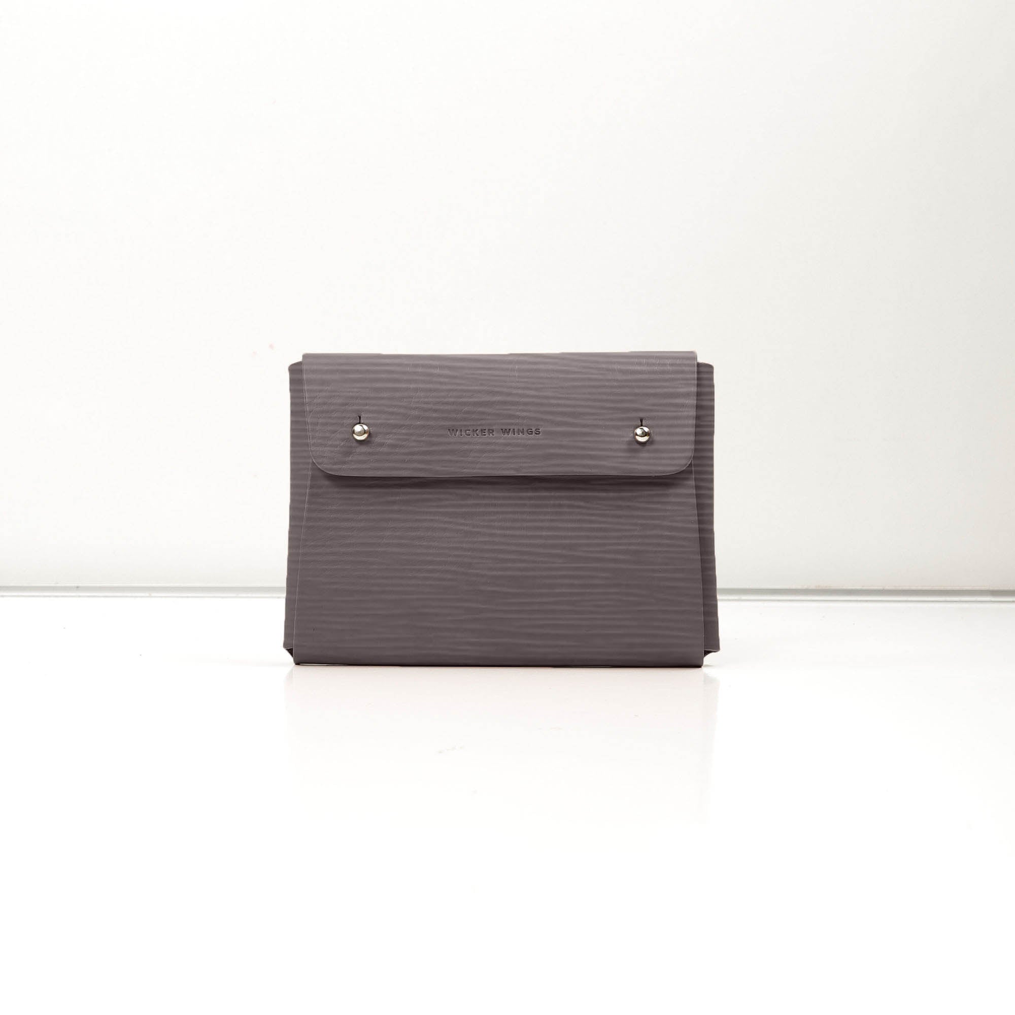 Pouch-Kuai-Large-GreyWavy-1-LeatherPouch-Cocoa-Debossing-WickerWings-SustainableLeatherProducts-UpcycledLeather-SmallLeatherGoods-MadeinEngland-LeatherAccessories-WickerBag-WickerHand_fbb4a697-bc70-4cd8-8a3e-dc5f2ed10337.jpg