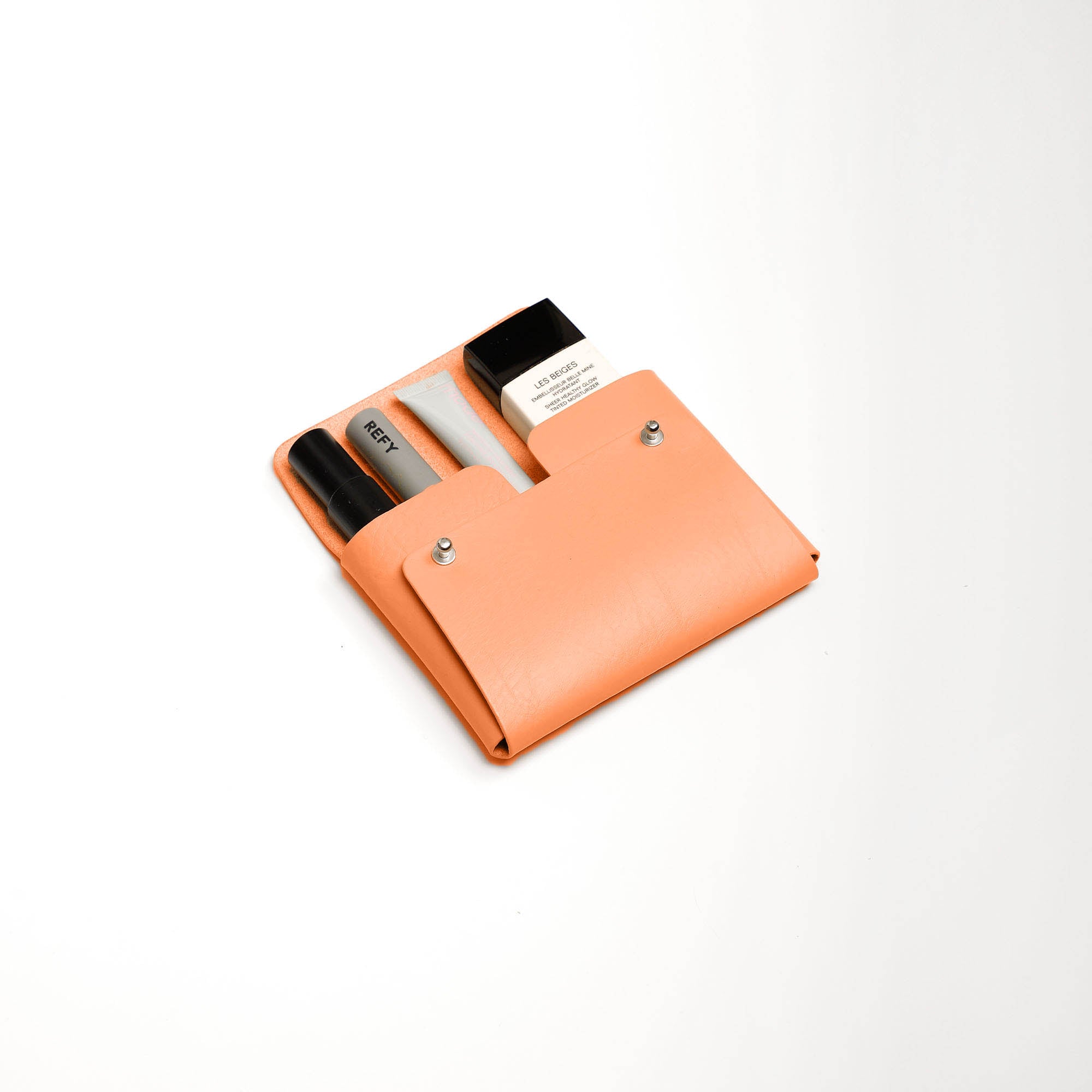 Pouch-Kuai-Orange-Medium-Front-3-LeatherPouch-Cocoa-Debossing-WickerWings-SustainableLeatherProducts-UpcycledLeather-SmallLeatherGoods-MadeinEngland-LeatherAccessories-WickerBag-Wicke_d2e80b86-84c9-4ff8-9086-58641d4be86e.jpg