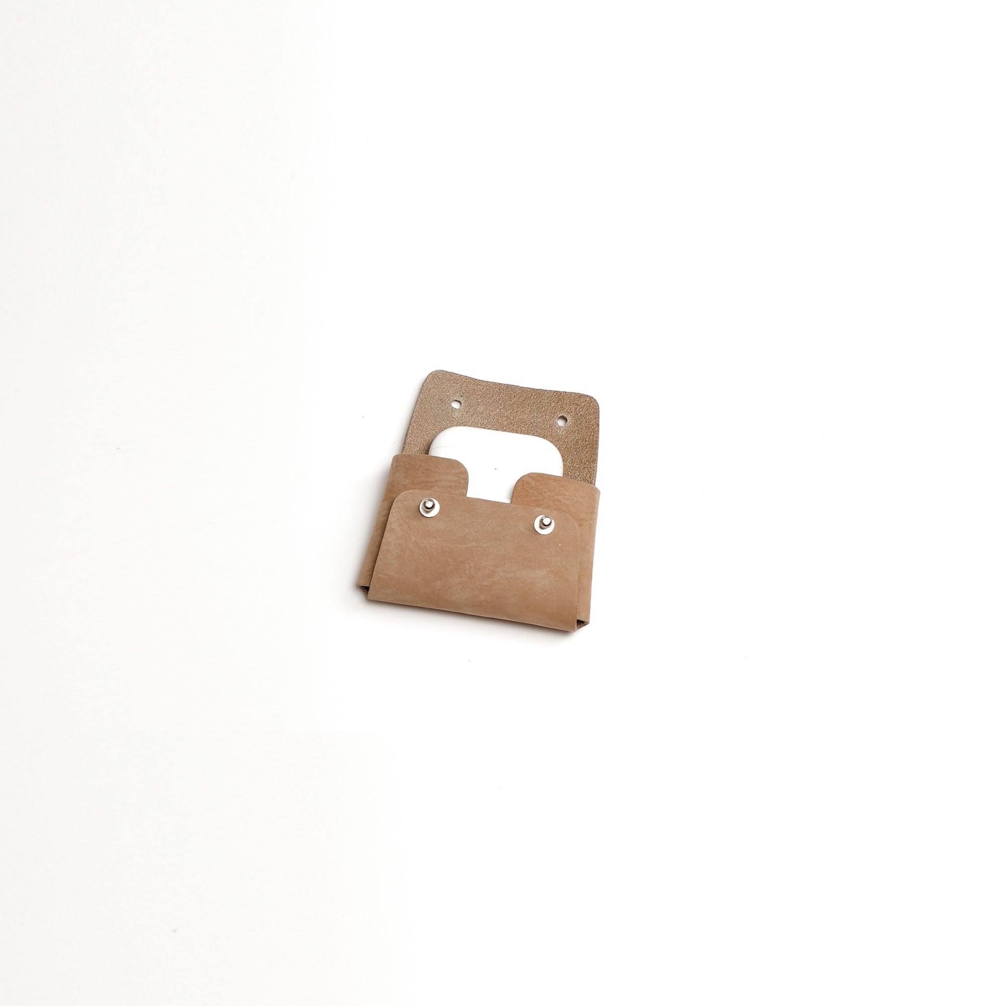 Pouch-Kuai-Small-Nutmeg-Interior-1-LeatherPouch-Cocoa-Debossing-WickerWings-SustainableLeatherProducts-UpcycledLeather-SmallLeatherGoods-MadeinEngland-LeatherAccessories-WickerBag-Wic.jpg