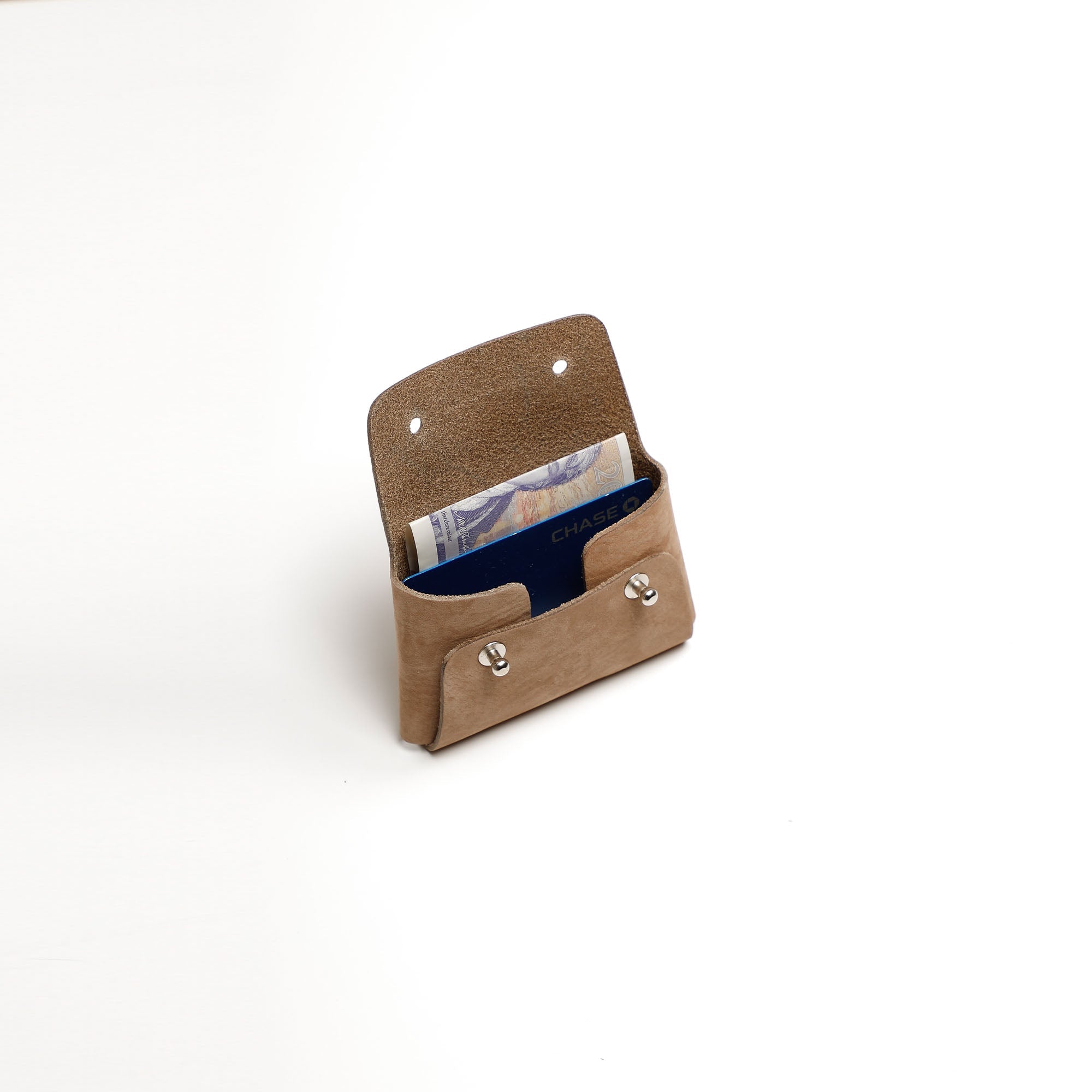 Pouch-Kuai-Small-Nutmeg-Interior-2-LeatherPouch-Cocoa-Debossing-WickerWings-SustainableLeatherProducts-UpcycledLeather-SmallLeatherGoods-MadeinEngland-LeatherAccessories-WickerBag-Wic.jpg