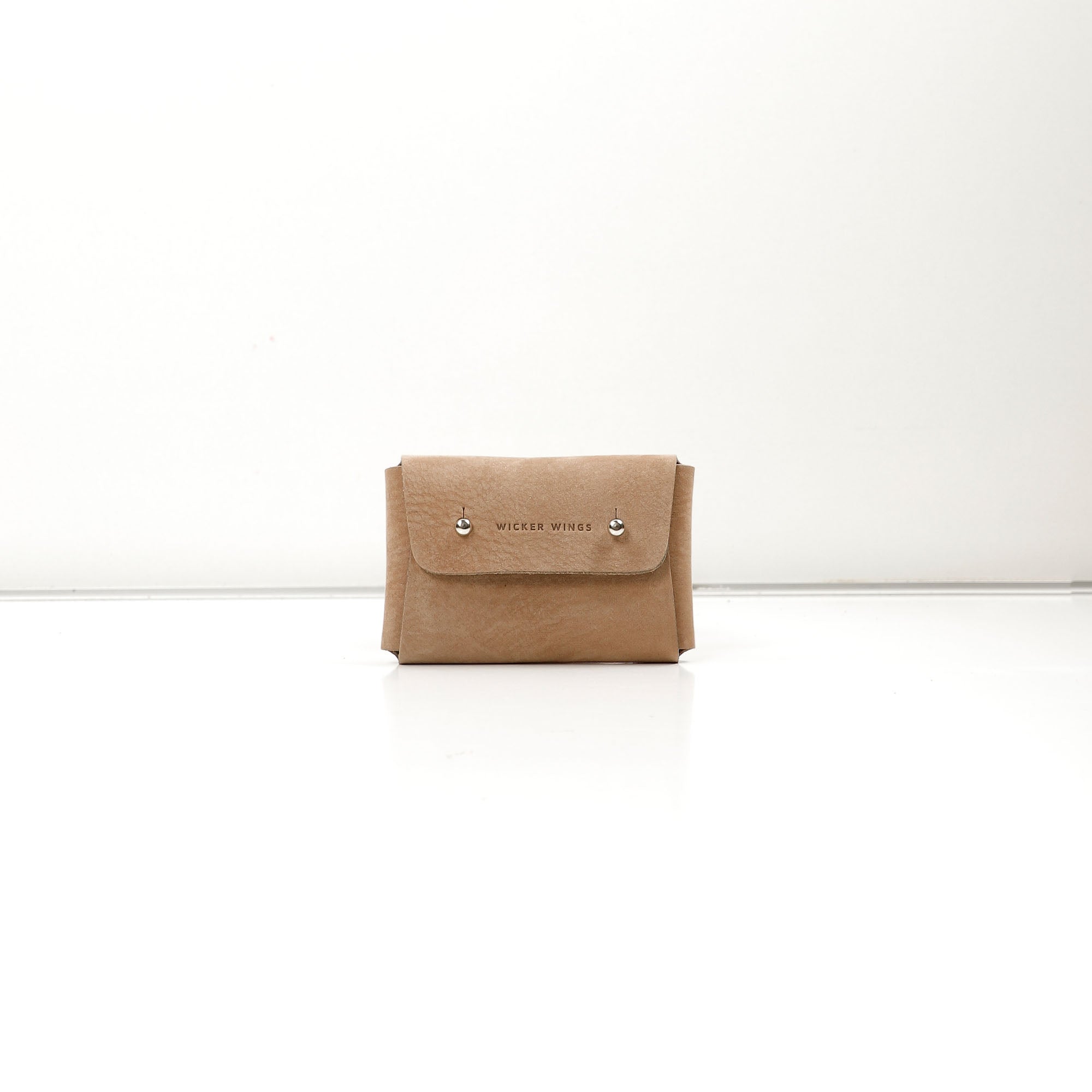 Pouch-Kuai-Small-Nutmeg-LeatherPouch-Cocoa-Debossing-WickerWings-SustainableLeatherProducts-UpcycledLeather-SmallLeatherGoods-MadeinEngland-LeatherAccessories-WickerBag-WickerHandbag.jpg