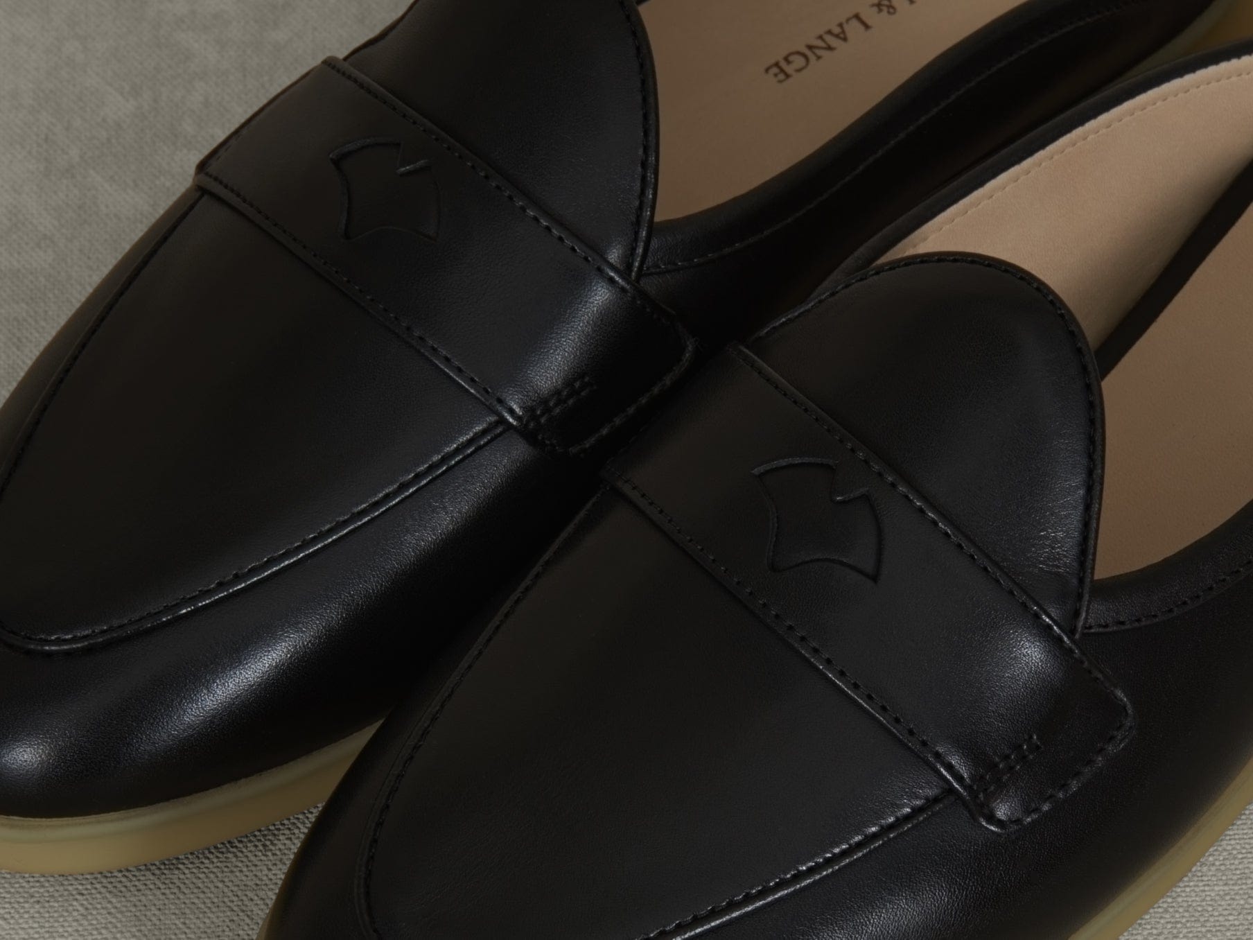 Stride Penny Mule Loafers in Black Milled Calf