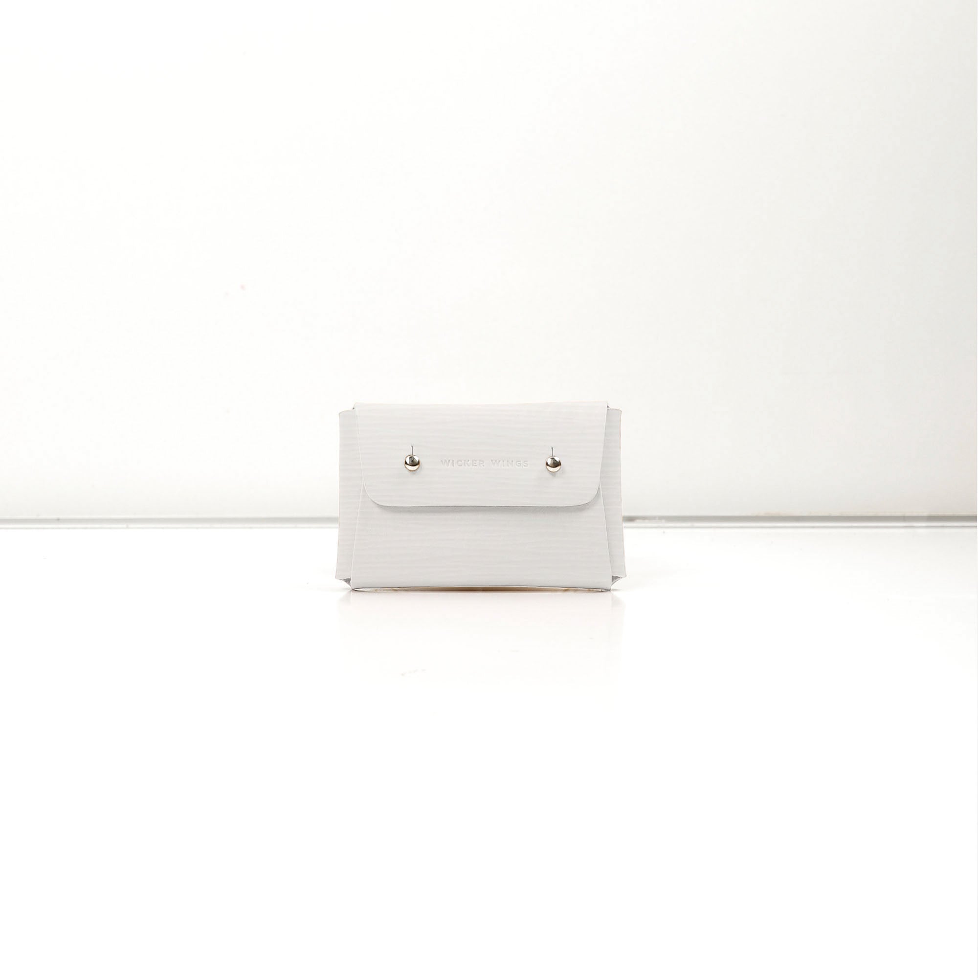 WickerWings-Pouch-Small-WhiteWavy-1_18e91ef4-7f48-47b6-a70c-e7a6a7bc2f14.jpg