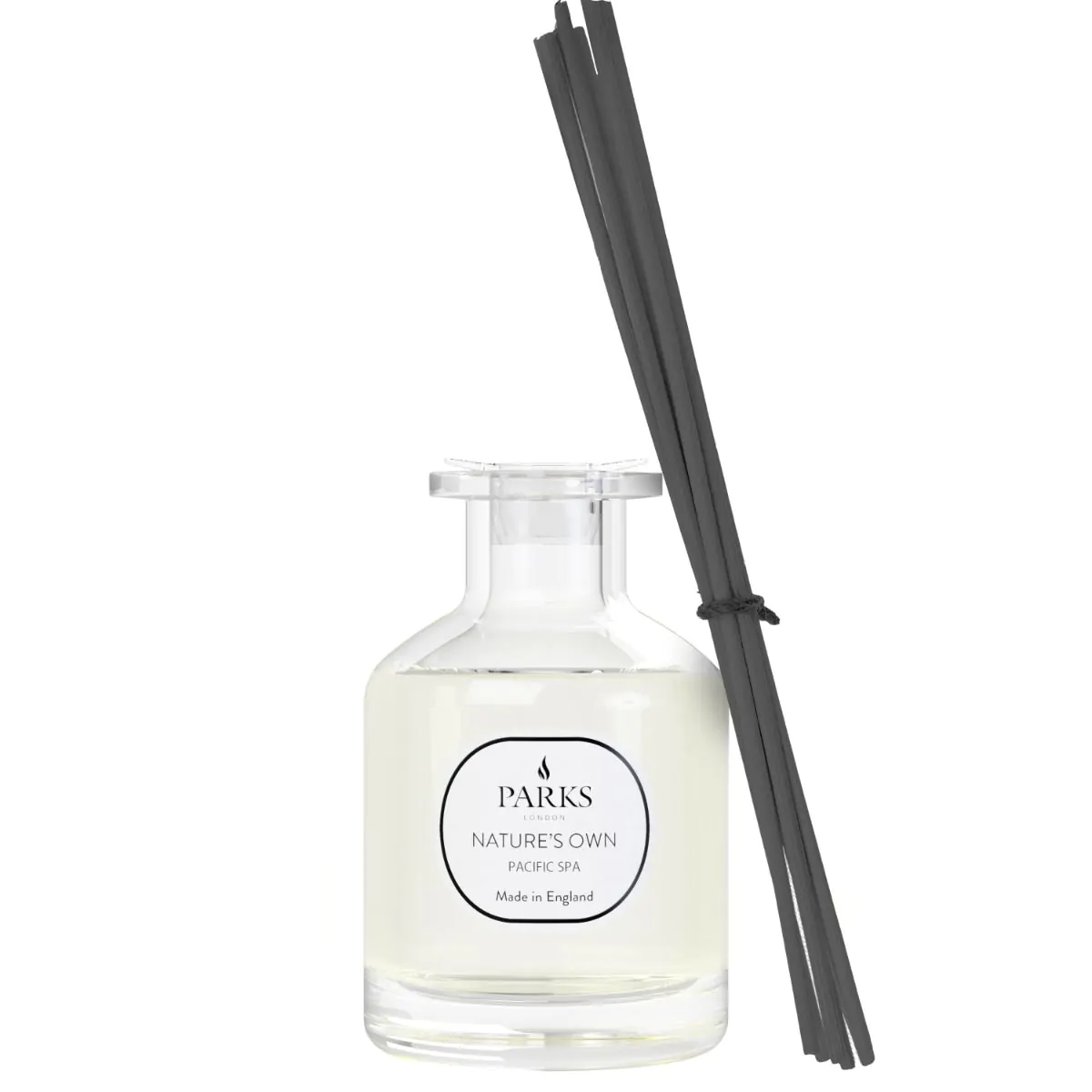 A PACIFIC SPA scented diffuser with a clear glass bottle and black reeds, labeled with 'Nature's Own' brand.