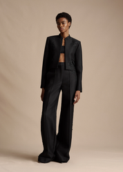 Model wearing the Embroidered Deeda Pant in Radzimir Wool with the Embroidered Bolero in Radzimir Wool.