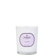 A white Parks branded lavender candle in an elegant glass vessel with a label indicating it is part of the Vintage Aromatherapy collection and made in England.