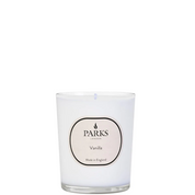A white vanilla scented candle with a label reading 'PARKS', 'Made in England' and 'Vanilla'. The candle is in an elegant glass vessel.