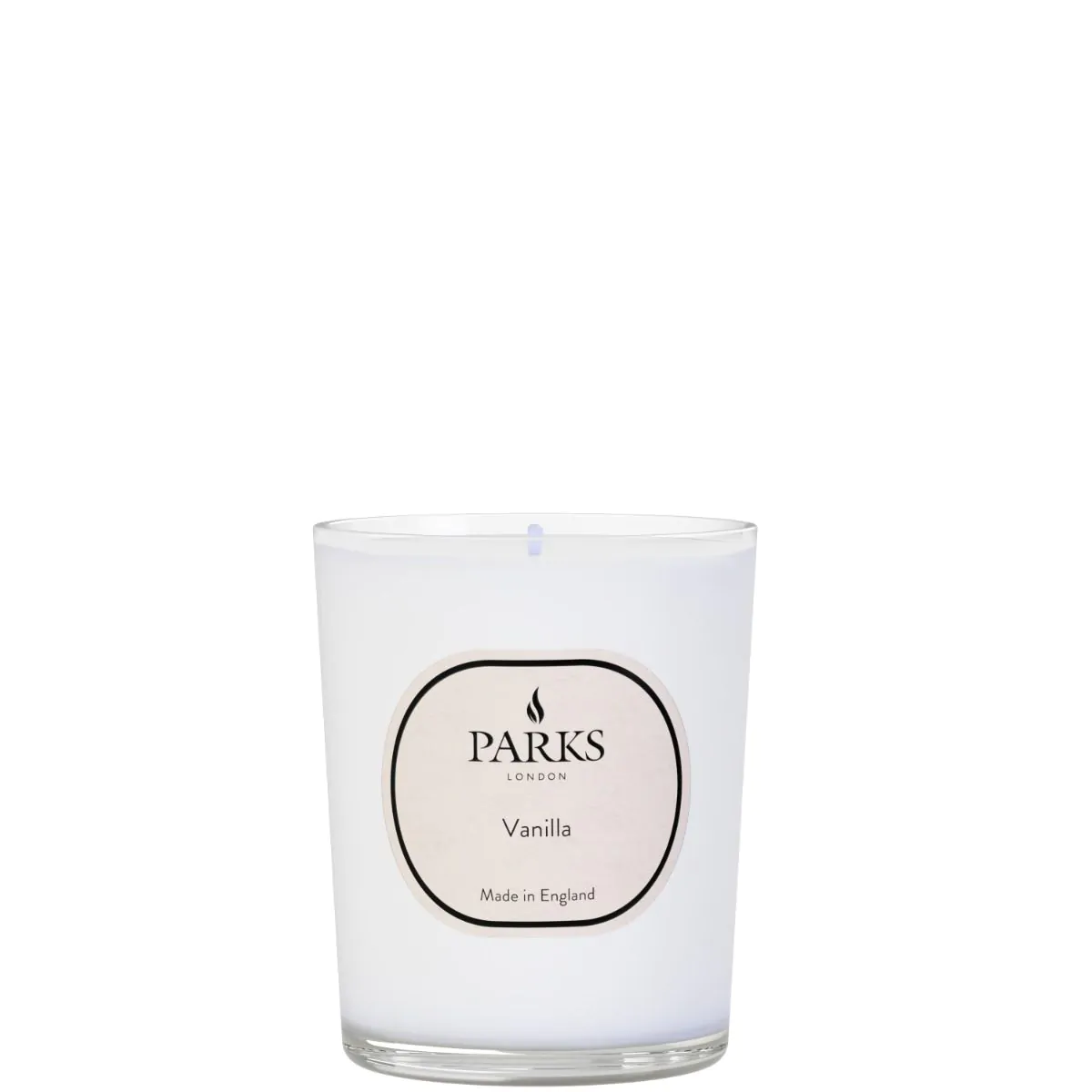 A white vanilla scented candle with a label reading 'PARKS', 'Made in England' and 'Vanilla'. The candle is in an elegant glass vessel.